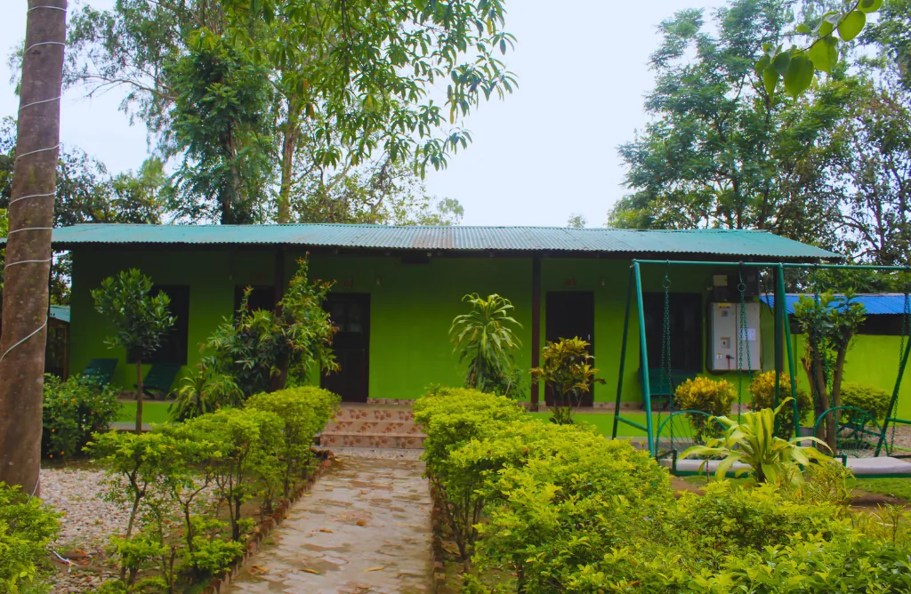 Garden grounds and lawns at Shuklaphanta Jungle Cottage